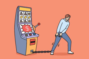 Gambling addiction of man tied with chain to slot machine representing debt.