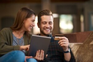 Couple with tablet for credit score.